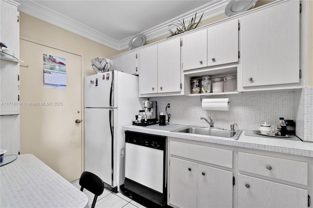 kitchen featuring sink, white cabinets, white fridge, stainless steel dishwasher, and crown molding