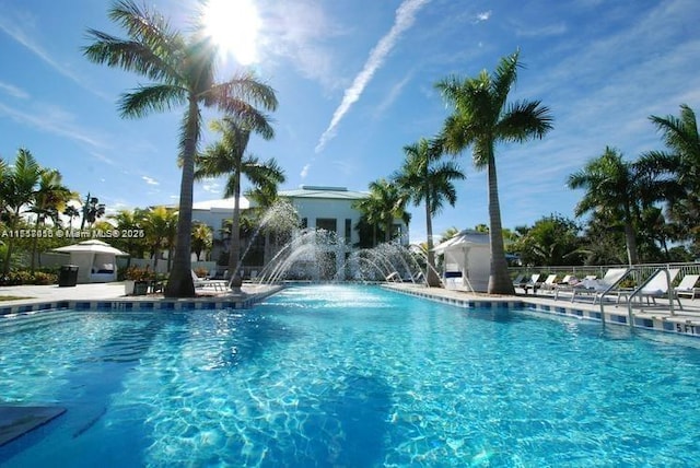 view of pool featuring pool water feature