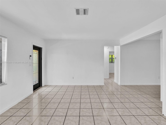 view of tiled spare room