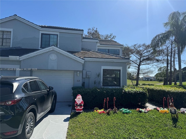 front of property with a garage