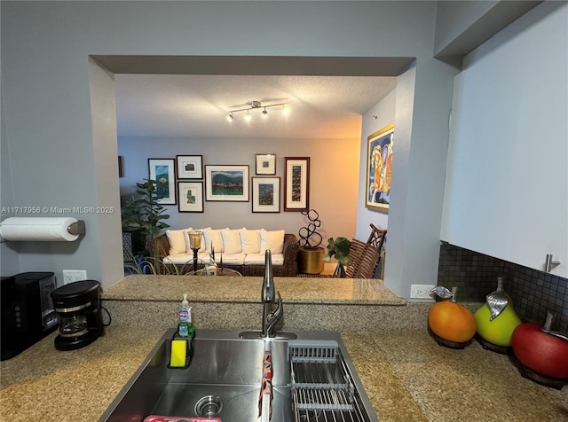 kitchen featuring track lighting