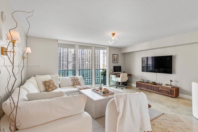 living room with a textured ceiling