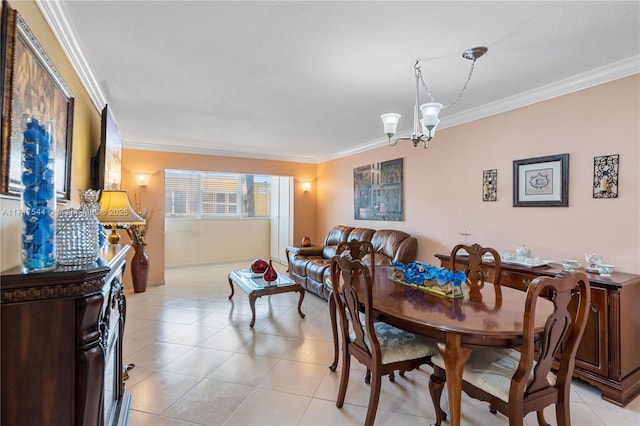 dining area featuring an inviting chandelier and ornamental molding