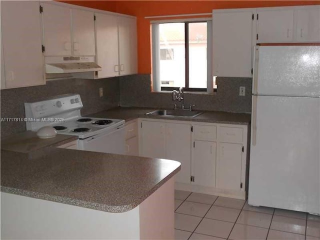 kitchen featuring white cabinets, white appliances, and sink