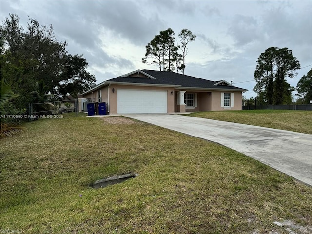 ranch-style home with a garage and a front lawn