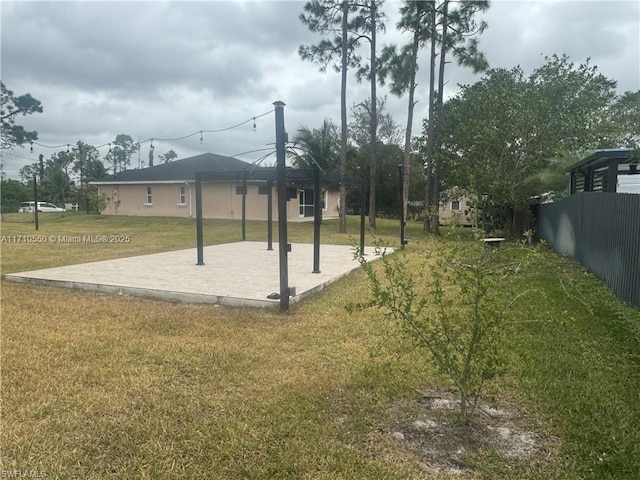 view of property's community with a gazebo and a yard