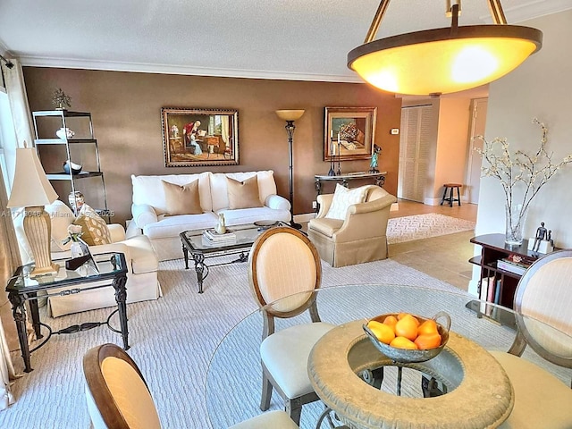 living room featuring a textured ceiling and ornamental molding