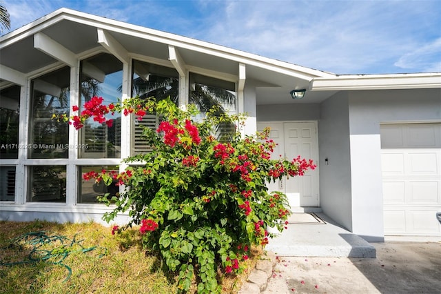 entrance to property with a garage