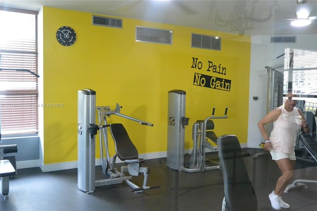 workout area featuring plenty of natural light