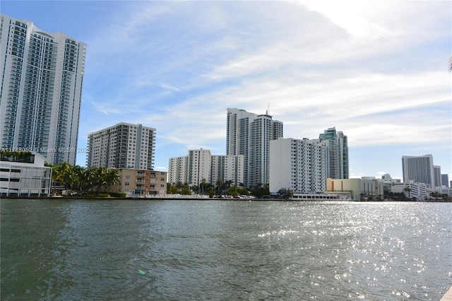 property's view of city featuring a water view