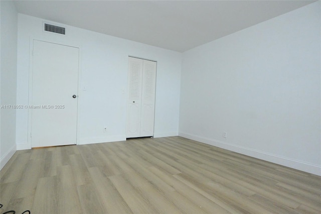 unfurnished bedroom with light hardwood / wood-style flooring