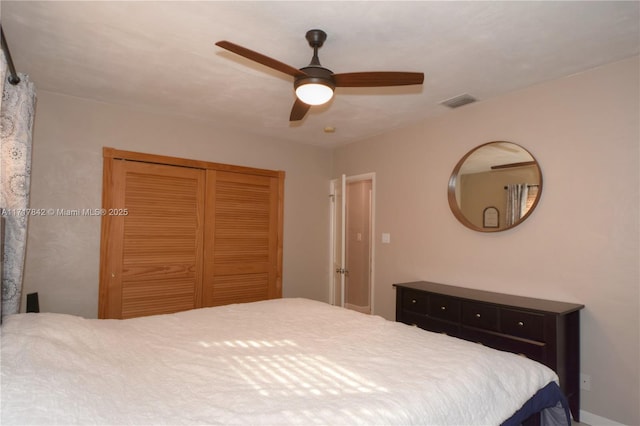 bedroom with a closet and ceiling fan