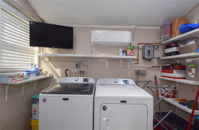 laundry area with independent washer and dryer