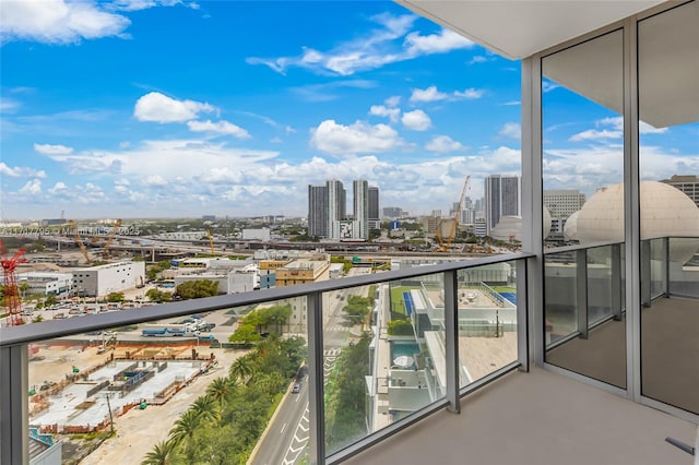 balcony featuring a view of city