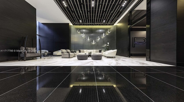 bathroom featuring a towering ceiling