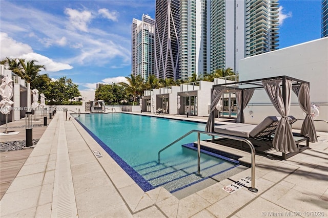 community pool featuring a patio