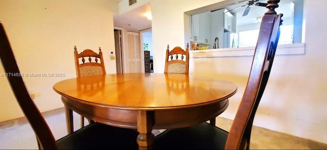 dining room with ceiling fan