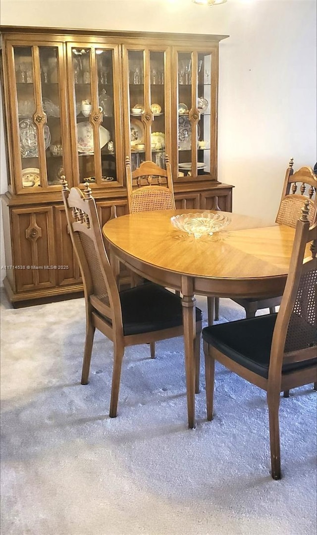 view of carpeted dining room