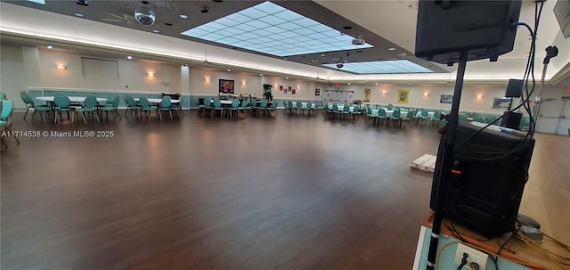 exercise room featuring hardwood / wood-style floors