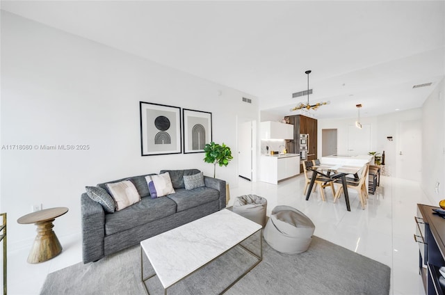 living room featuring light tile patterned flooring