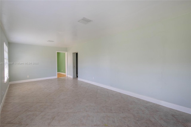 view of tiled spare room