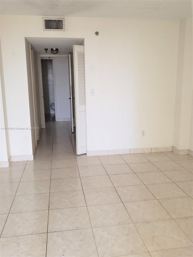 view of tiled spare room