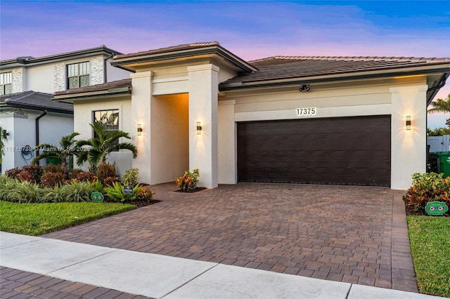 view of front of house with a garage