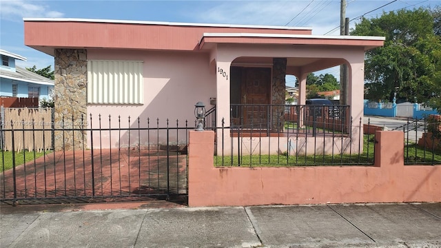 bungalow featuring covered porch