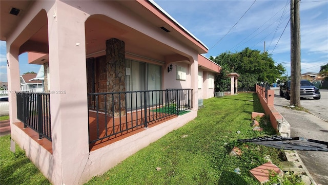 view of home's exterior featuring a lawn