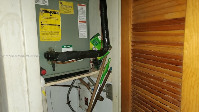 utility room with heating unit