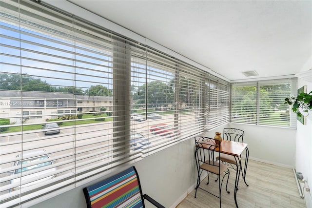 sunroom featuring a healthy amount of sunlight