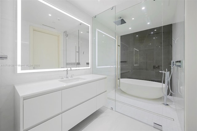 bathroom featuring tile patterned flooring, vanity, and independent shower and bath