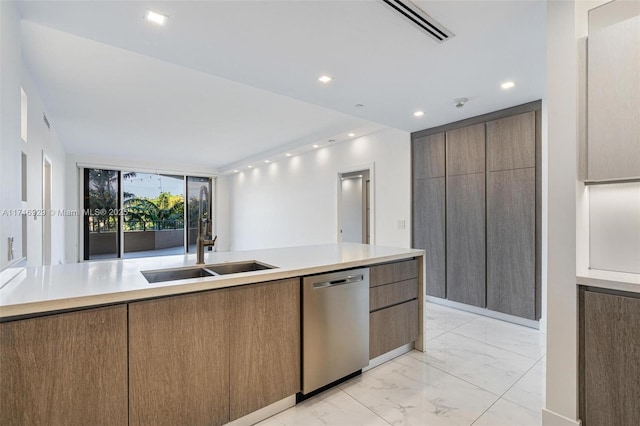 kitchen featuring stainless steel dishwasher and sink