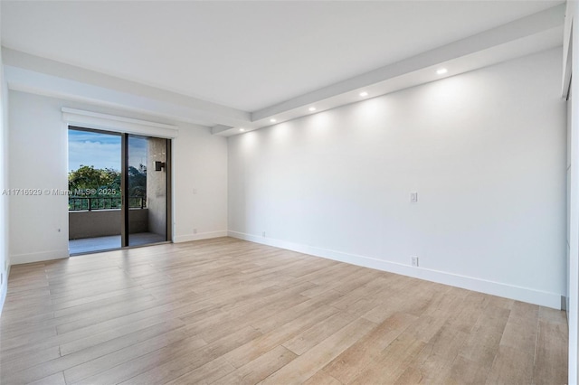 empty room featuring light hardwood / wood-style flooring