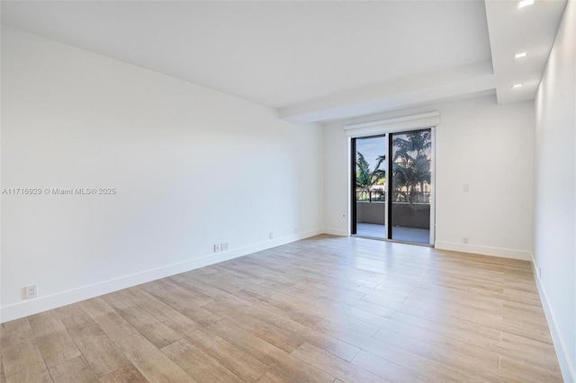 empty room featuring light hardwood / wood-style floors