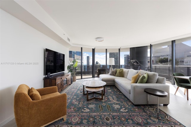 living room with a wall of windows