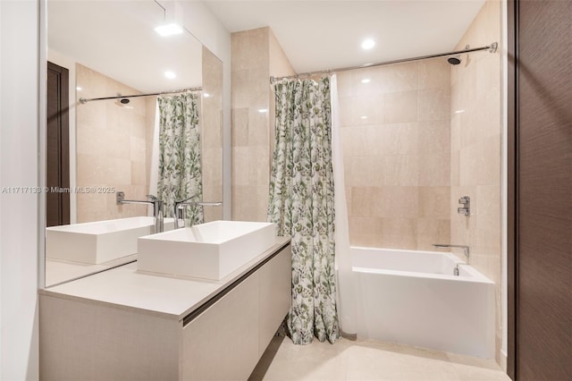 bathroom featuring tile patterned floors, vanity, tile walls, and shower / tub combo with curtain