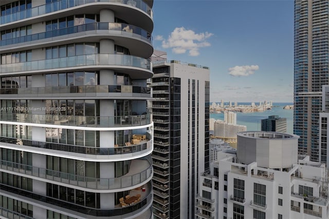 view of building exterior with a water view