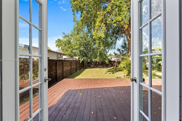 deck featuring a lawn