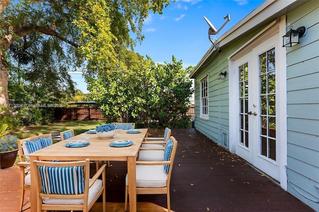 view of patio / terrace with a wooden deck and french doors