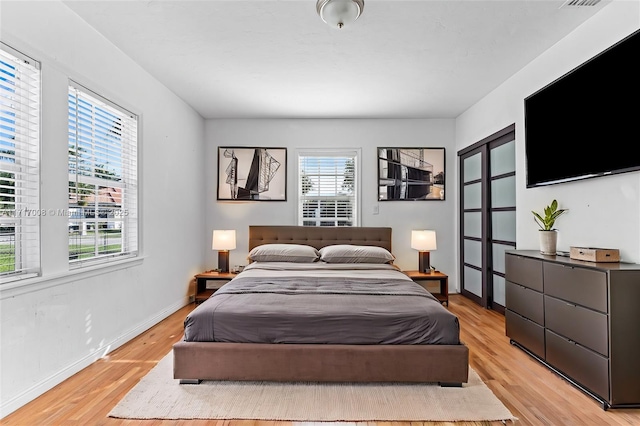 bedroom featuring light hardwood / wood-style flooring