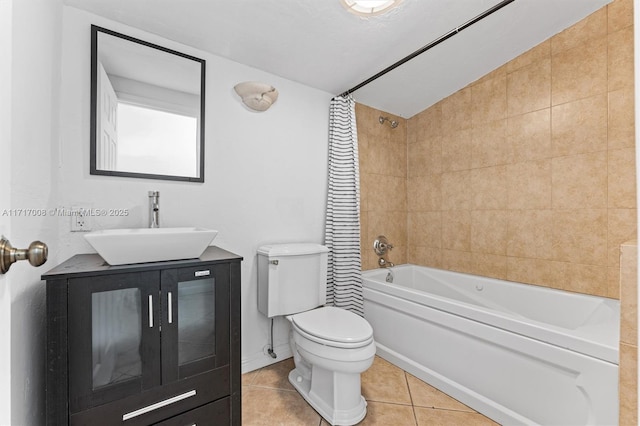 full bathroom featuring tile patterned floors, vanity, shower / tub combo, and toilet