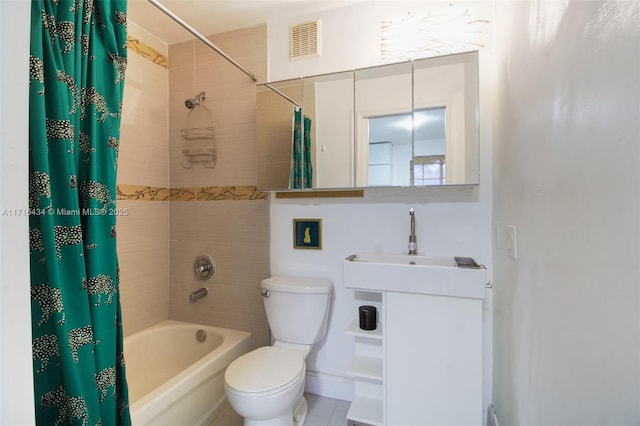 full bathroom with shower / tub combo with curtain, vanity, and toilet