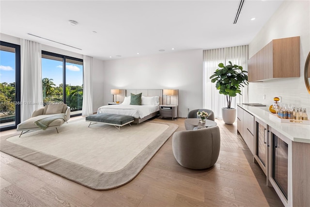 bedroom with light hardwood / wood-style flooring