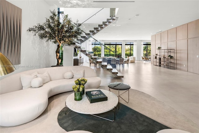 living room featuring concrete floors