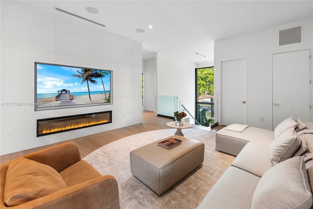 living room with light wood-type flooring