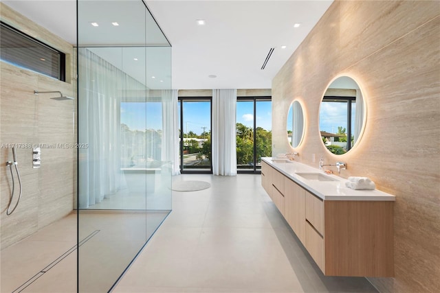 bathroom with vanity and walk in shower