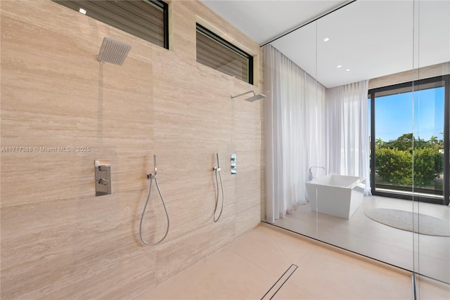 bathroom with tile patterned floors and plus walk in shower