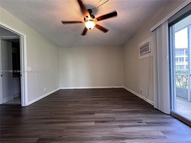 151 SW 135th Ter Unit 106T, Pembroke Pines, FL 33027 - spare room featuring ceiling fan, a wall mounted AC, a textured ceiling, and a wealth of natural light