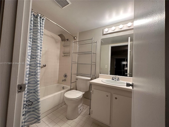 full bathroom with tile patterned floors, vanity, shower / bath combo, and toilet